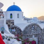 Beautiful womanwith hat in Oia
